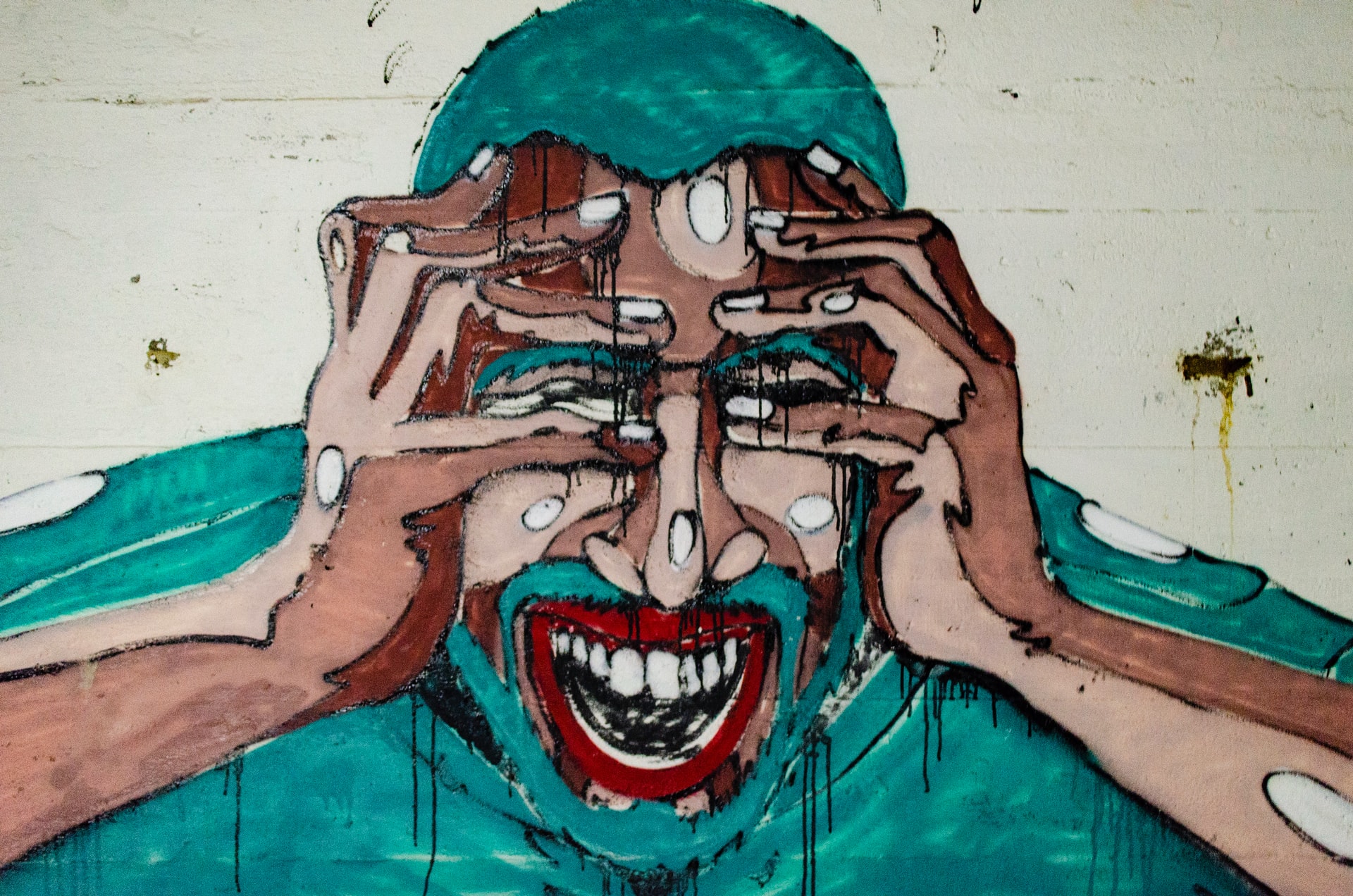 Illustration of person screaming with hands on head to illustrate chronic pain