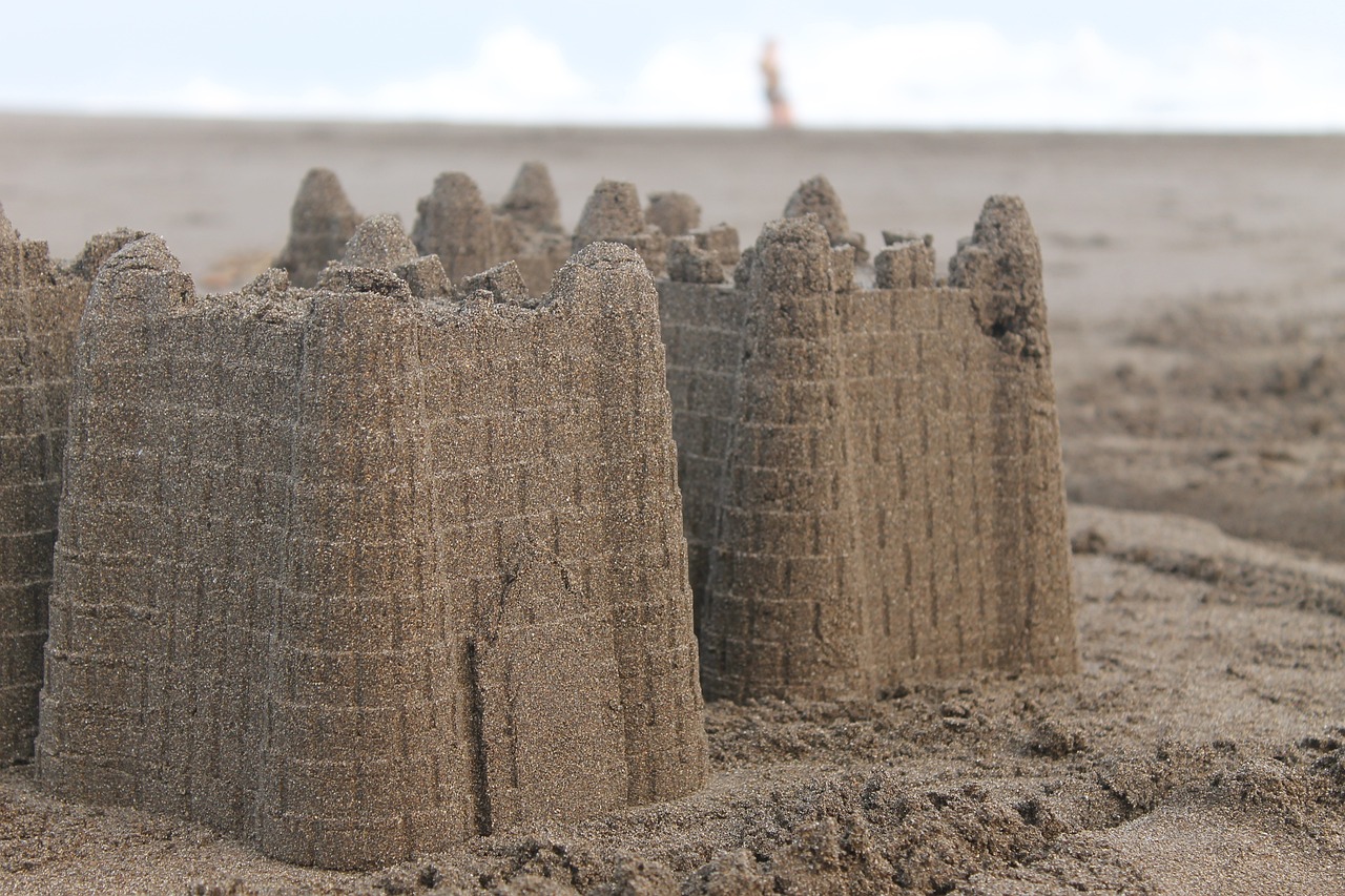 A sandcastle on a beach.
