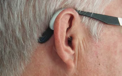 man's ear with hearing aid