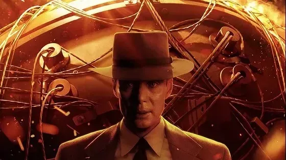 Graphic of actor Cillian Murphy playing J. Robert Oppenheimer stood in front of the atomic bomb.