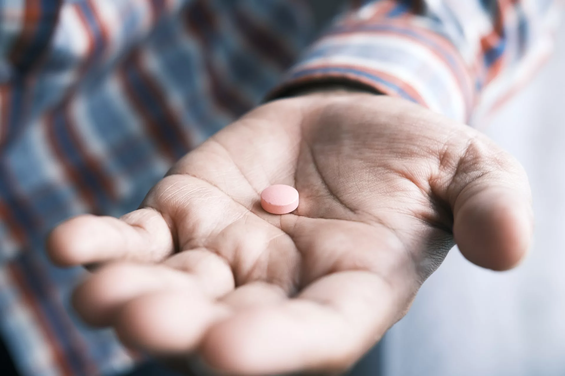 pill in someones hand